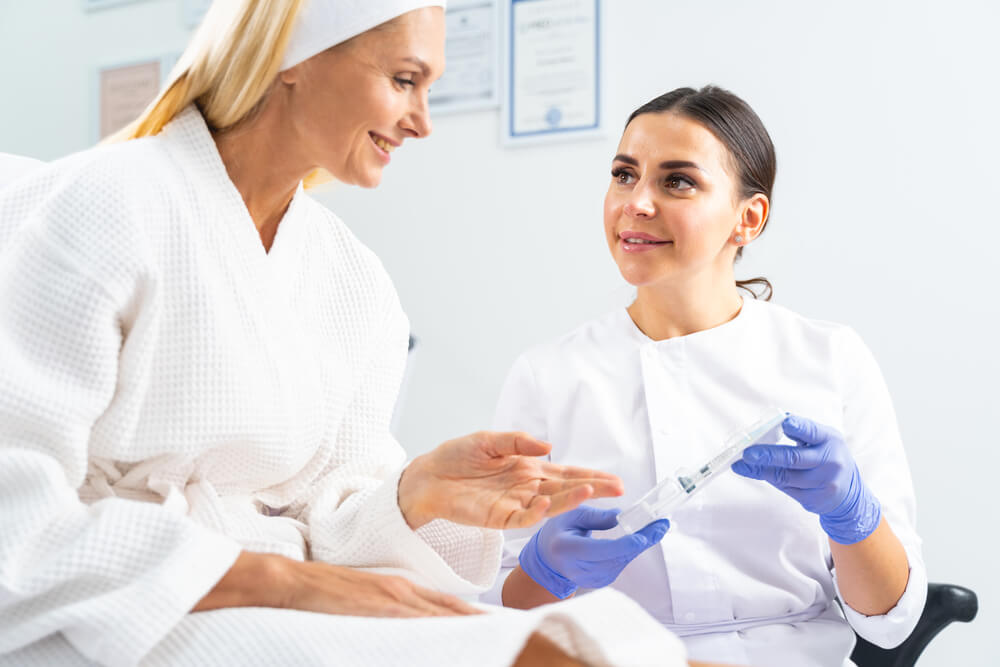 Woman consulting her doctor for Dermal fillers