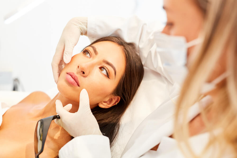 dermatologist in session with her client
