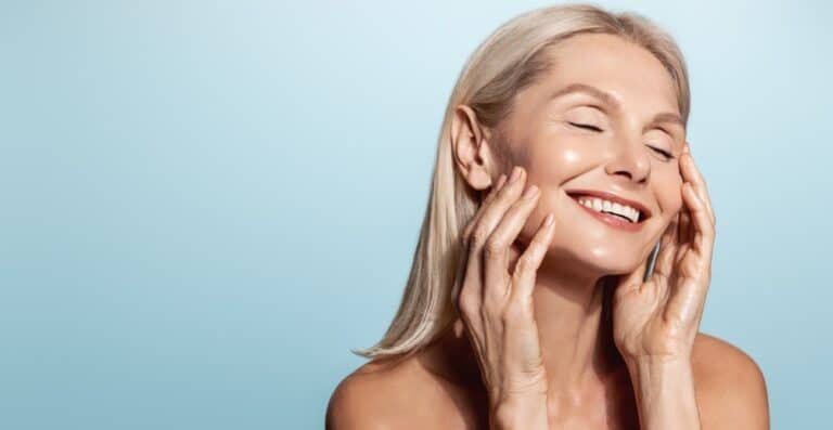 Woman with smooth facial appearance after injectables in Houston, TX.