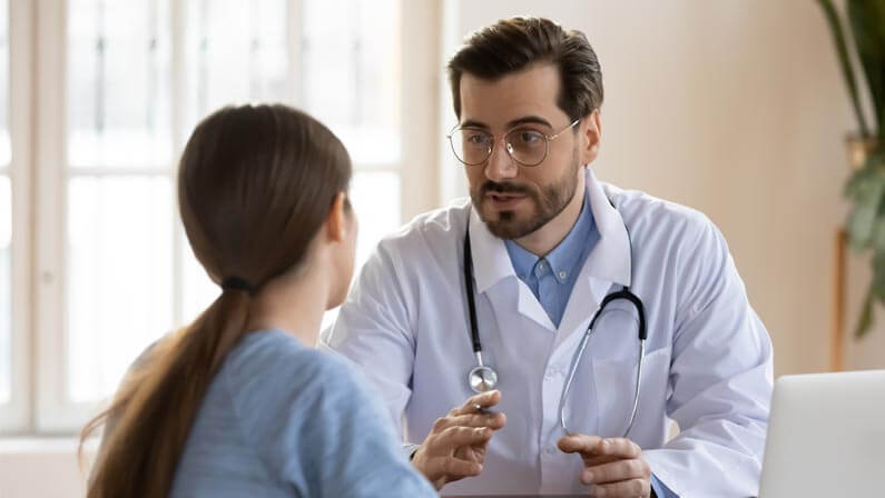 Doctor giving advice to his patient