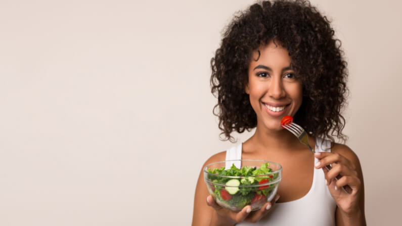 beautiful girl eating healthy foods